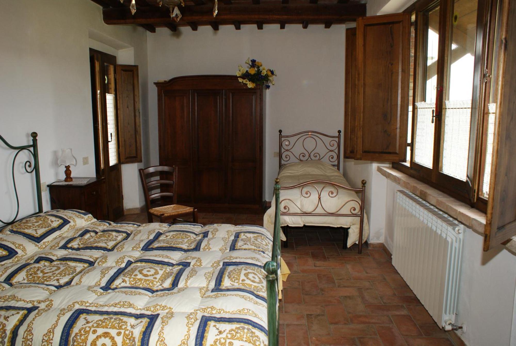 Villa La Rocca Della Magione à Monteriggioni Chambre photo